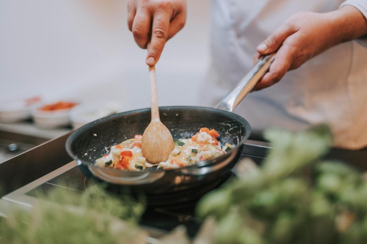 Hotel Miramare Цриквеница Экстерьер фото A wooden spoon being used in a pan